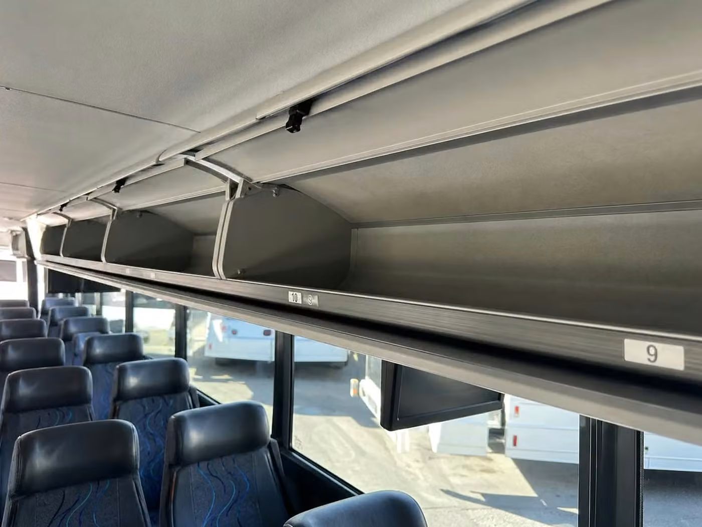 la quinta 28 passenger minibus overhead storage