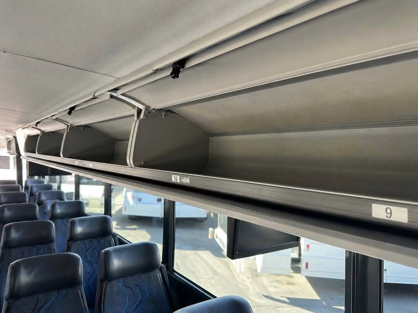 la quinta 56 passenger charter bus overhead storage